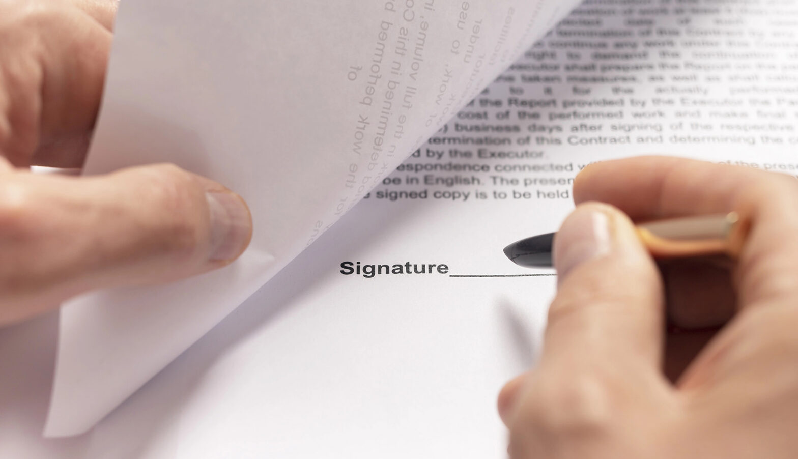 Contract signing concept. Businessman hand with pen over document closeup. banner